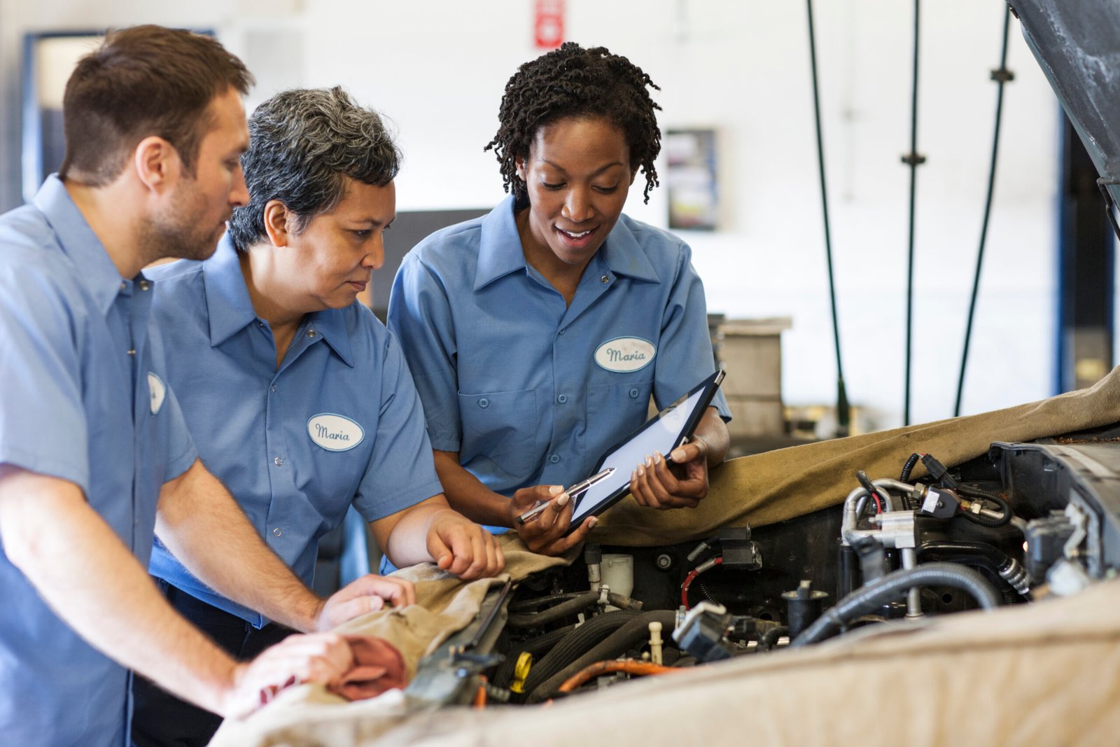 auto mechanics inspecting vehicle engine in garage 2026 01 09 09 08 13 utc scaled